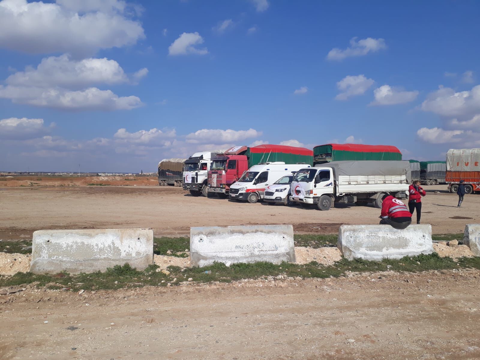 earthquake-response-in-syria-stand-your-ground-feature-230211-krc-convoy-waiting-at-che-fca44ebc